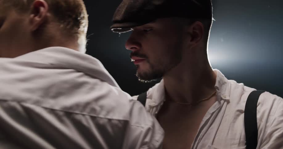 A male and female dancer perform a passionate and romantic dance together