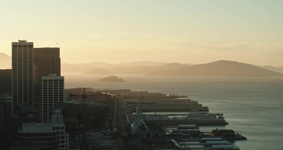 Aerial view of the san francisco city downtown and port skyline at sunset