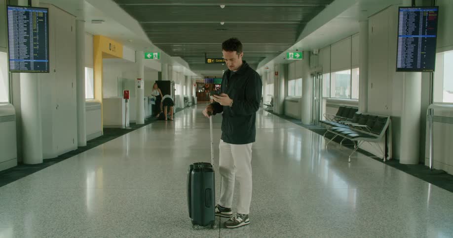 A man standing in an airport