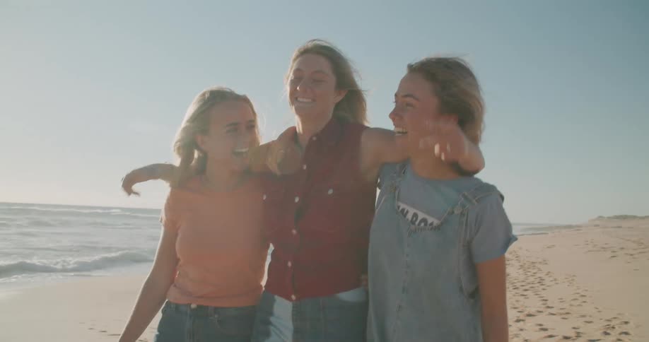 Three teenage girls on the beach
