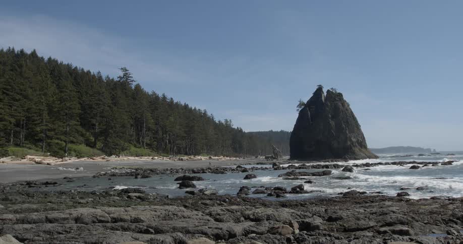 Water moves over rocks by the shore