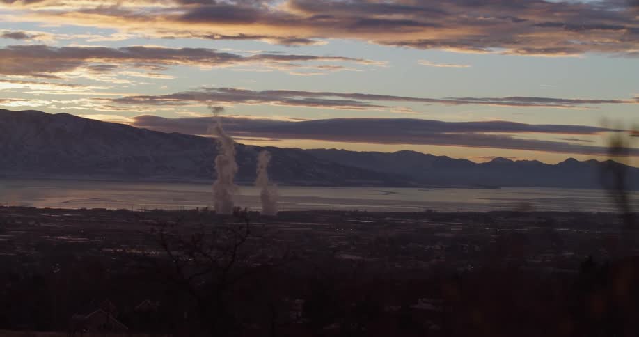 Landscape view of smoke rising from the ground on the shore