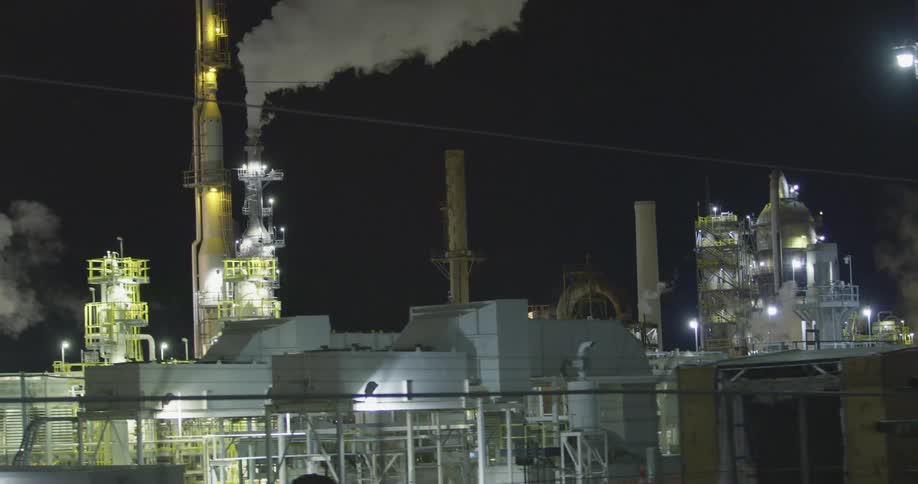 An oil refinery at night