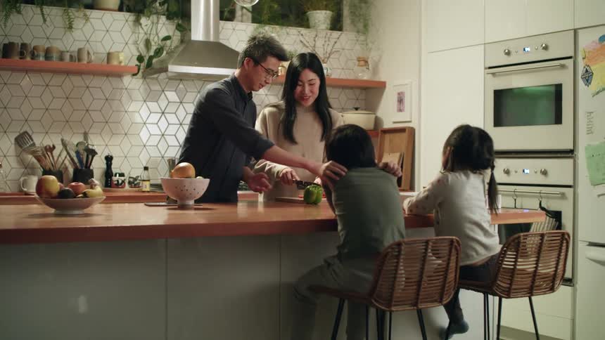 A family cooking in a kitchen