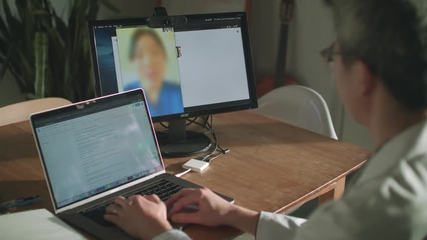 A man and woman talking on a video chat app
