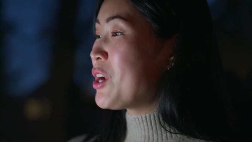 Close up of a woman as she talks