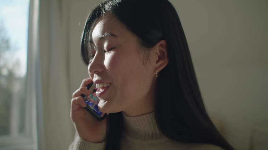 A woman talking on her phone