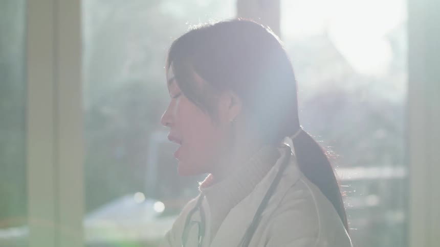A female doctor talking to someone