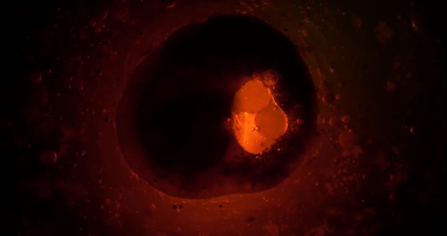 Black yellow and brown colors that look like a gel with bubbles