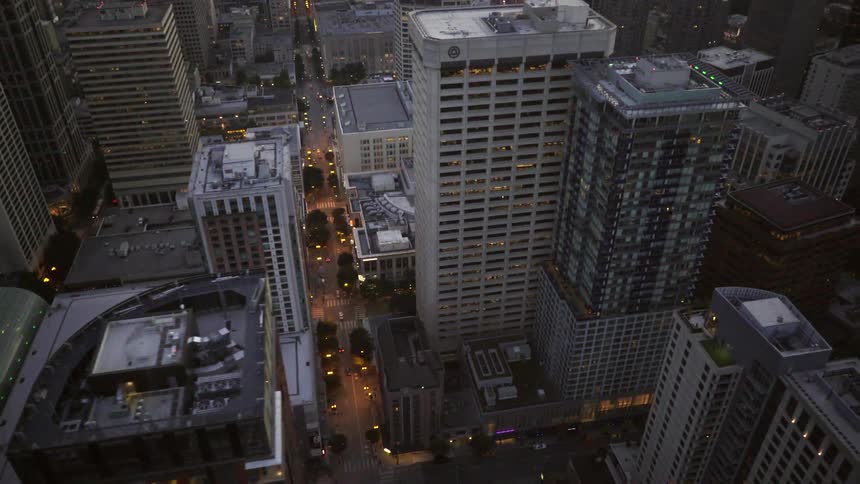 Aerial view of city buildings at night