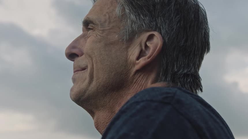 A man that appears to be on the verge of tears