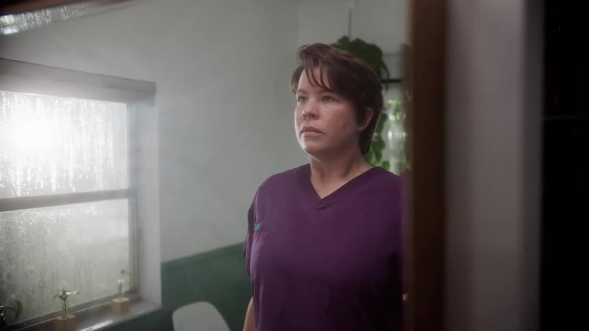 A woman in a bathroom