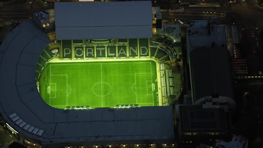 Providence Park Stadium sports and events venue with stadium and field hosting Major League Soccer, college football and more in downtown Portland Oregon in blue hour light