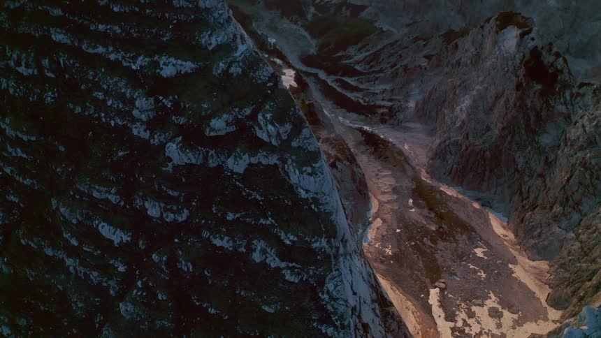 Aerial shot of a snowy mountaintop