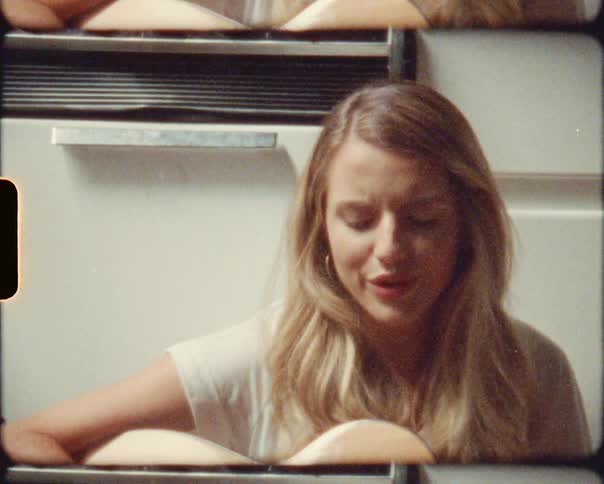 A woman playing the guitar