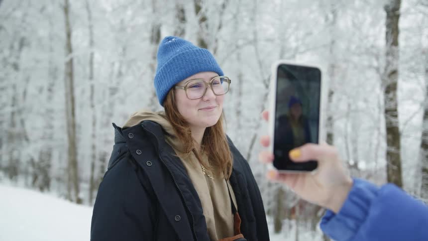 A woman having her photo taken