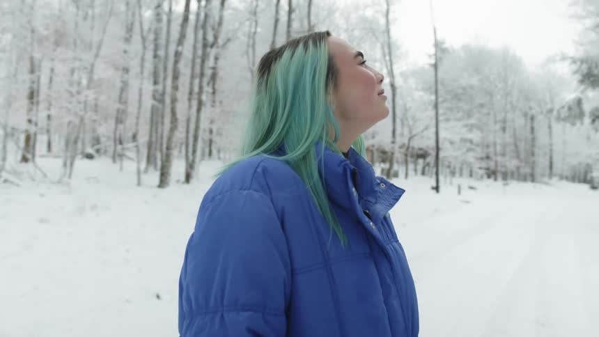 A woman standing in the snow