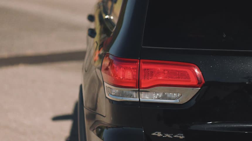 A car turning left with a turn signal on