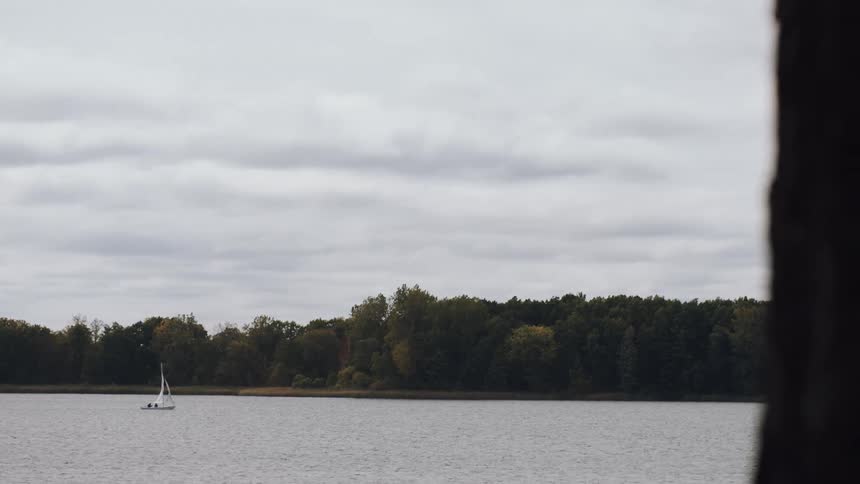 A small sailboat on a lake