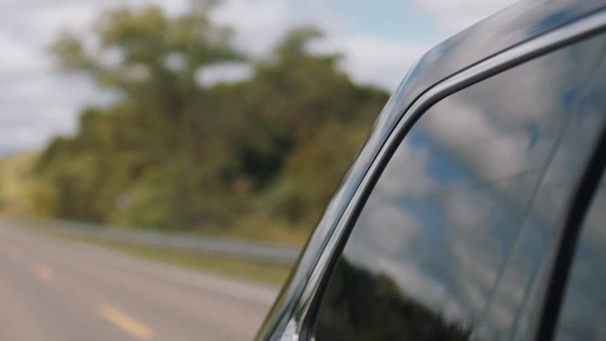 A car driving down a highway