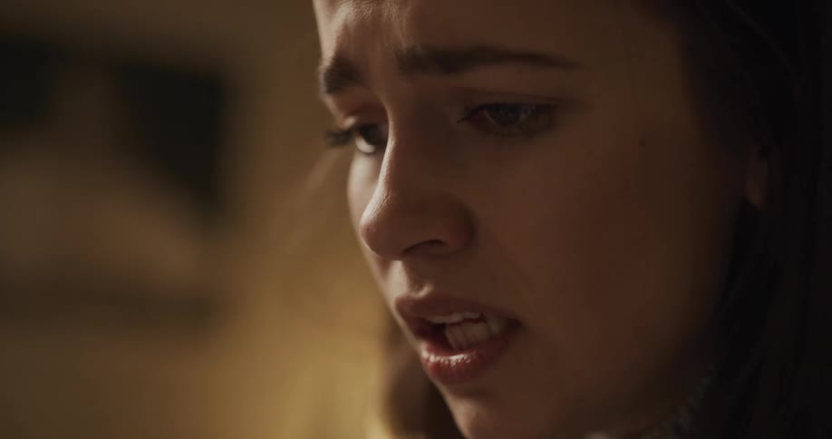 A woman who looks to be in pain