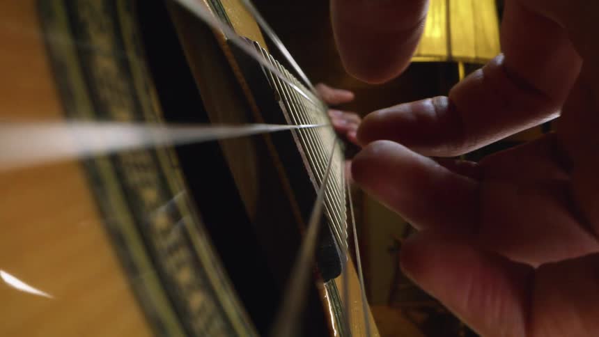 A person playing a guitar