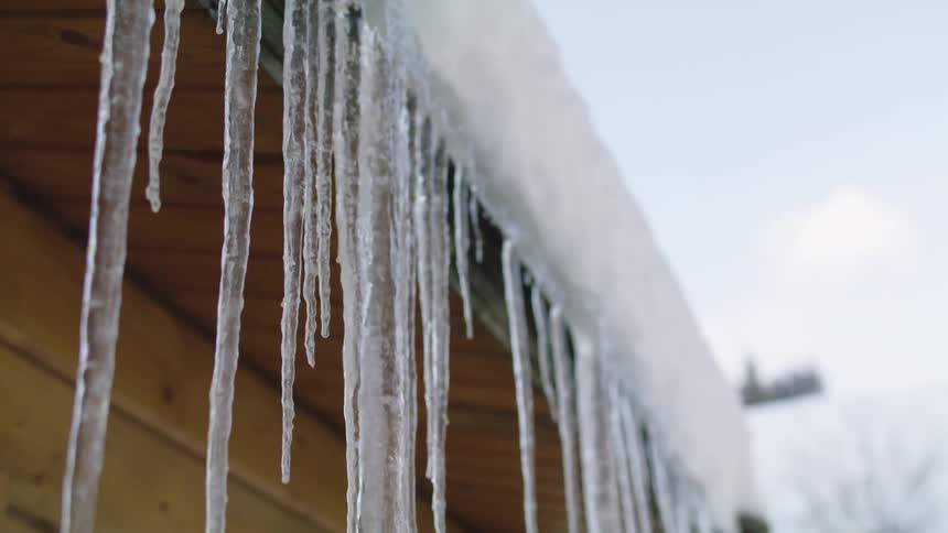 A close up of icicles