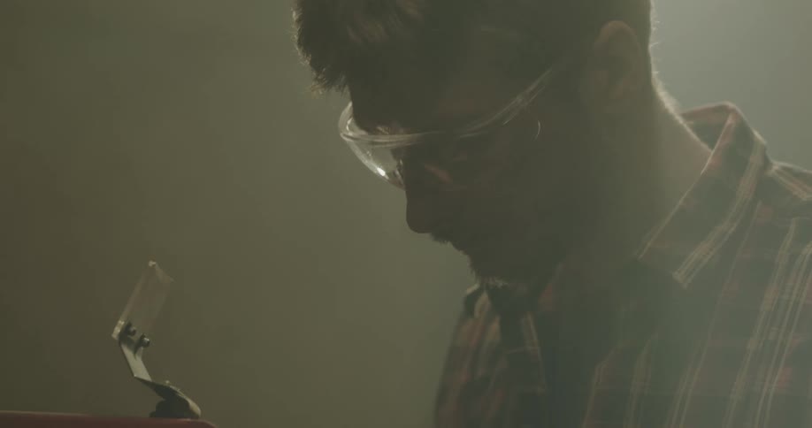 A man working on a piece of metal