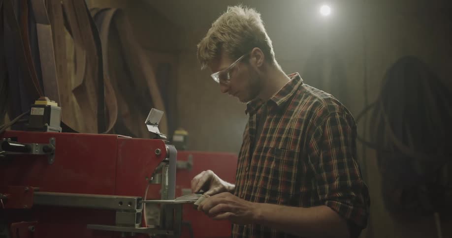 A man working on a lathe