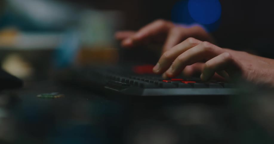 Person is typing on a keyboard