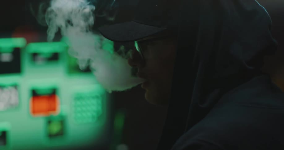 A close up of a person smoking