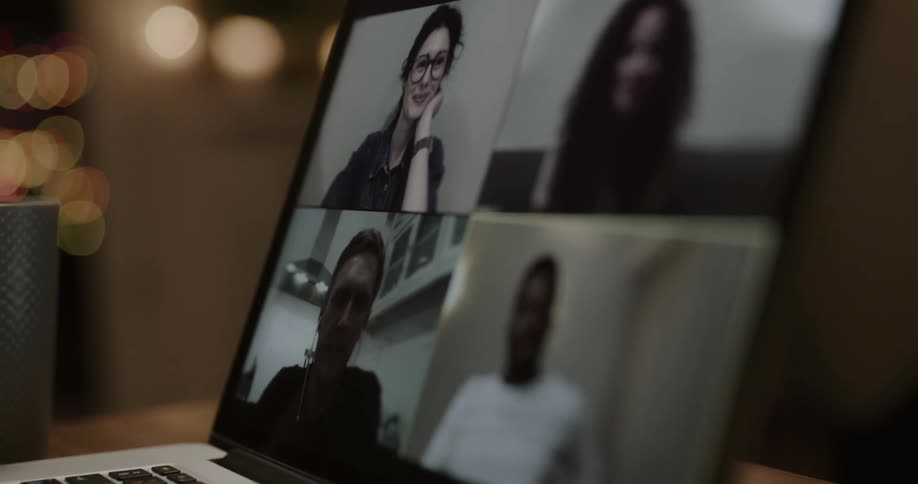 Video call with 4 people on a laptop