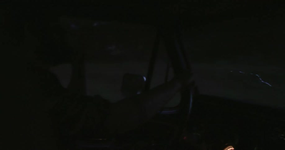 White man driving his car alone at dusk