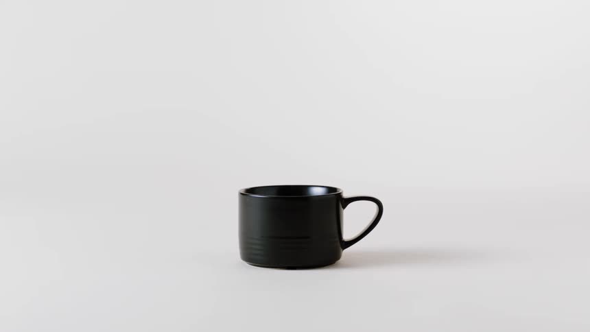 A view of a cup sitting on a table
