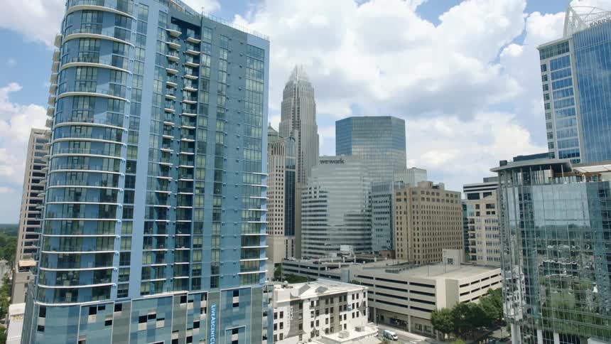 An aerial view of high rise office buildings in a city