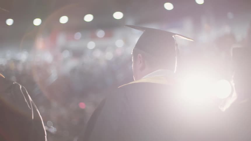 Graduates marching at their graduation ceremony