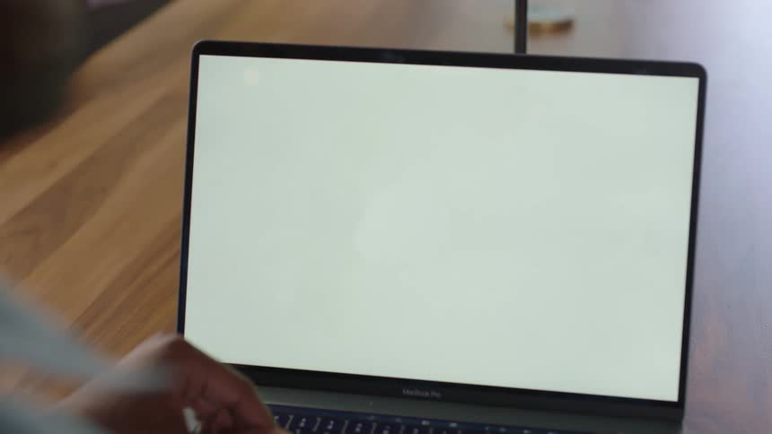 A man working from home on laptop
