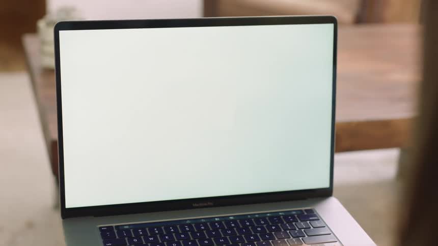 Laptop computer screen at a home office