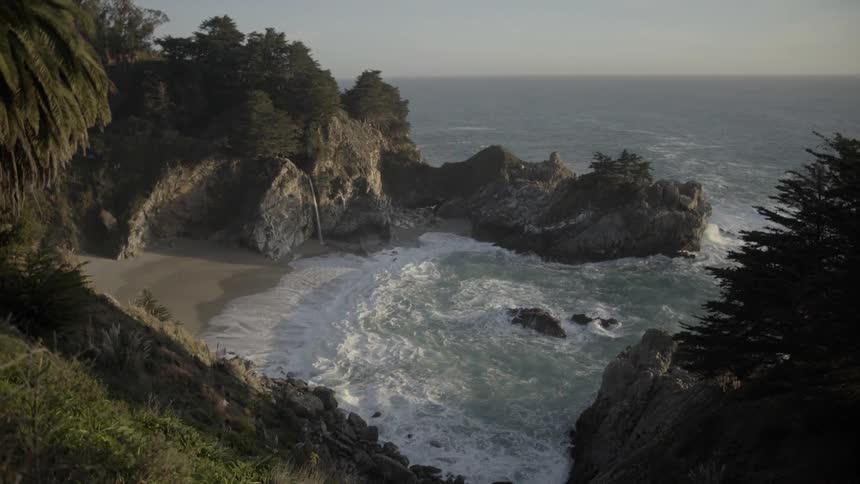 Waves washing on shore in a cove
