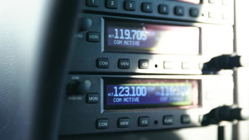 Numbers show on control panels full of buttons and knobs
