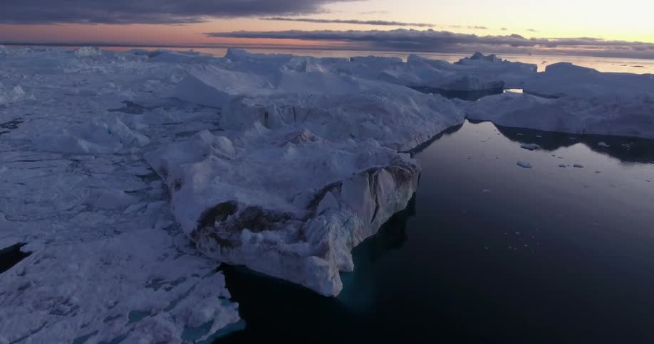 Arctic ice under dark clouds in the sky