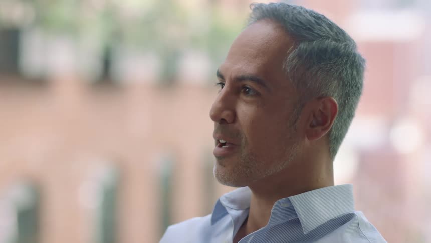 A man talking during a business meeting