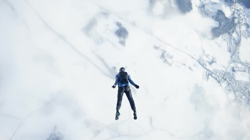 Aerial view of a person floating in the air as they skydive