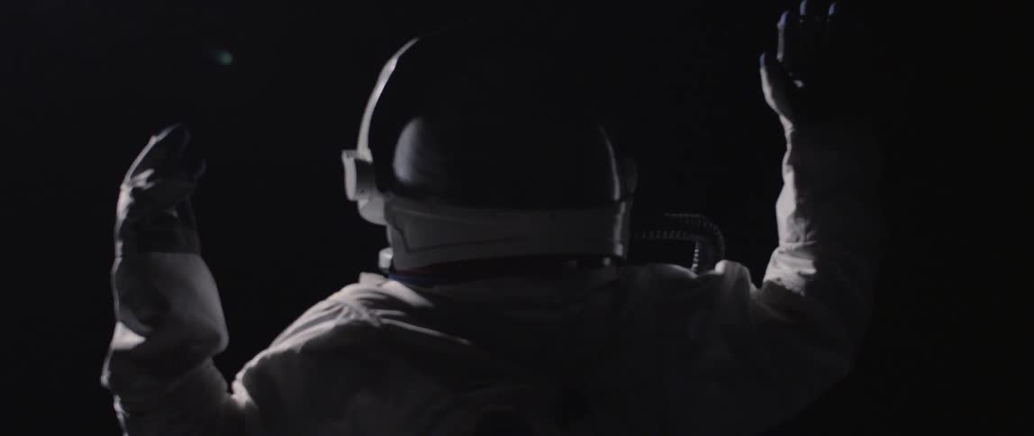 An astronaut floats in space