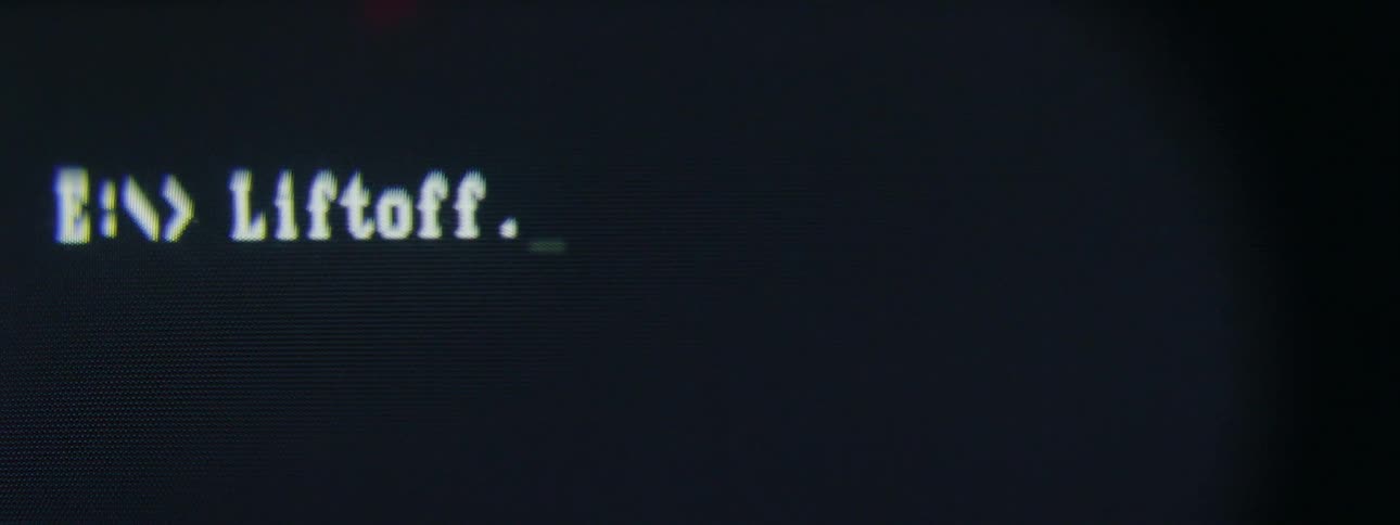 A computer screen with words and letters being typed onto it