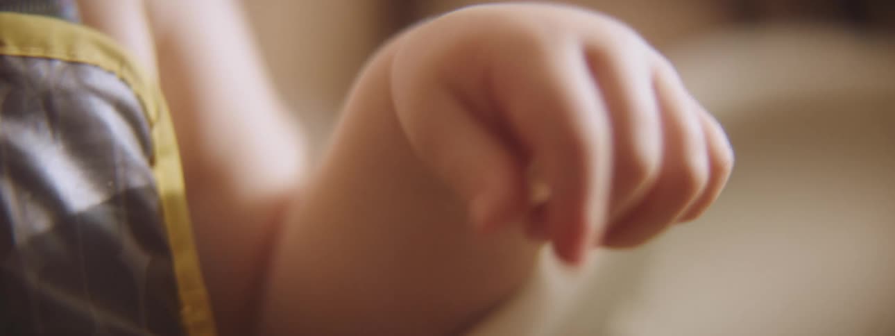 Shallow camera focus of a baby's hand
