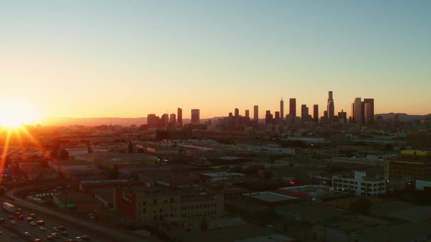 Aerial view of a downtown city is displayed at dusk