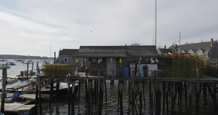 Houses sit on a pier over the water