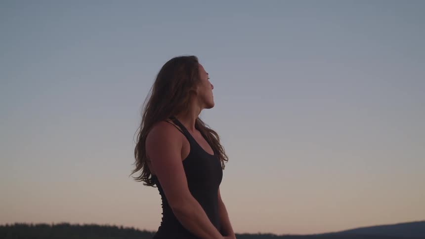 A portrait of a woman looking around