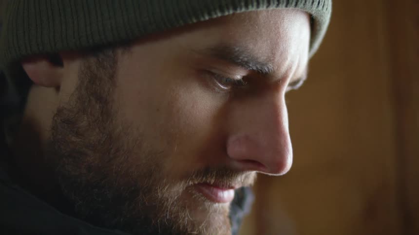 Close up of a man breathing the cold air